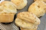 Gluten Free Cheese Popovers in pan on white cloth