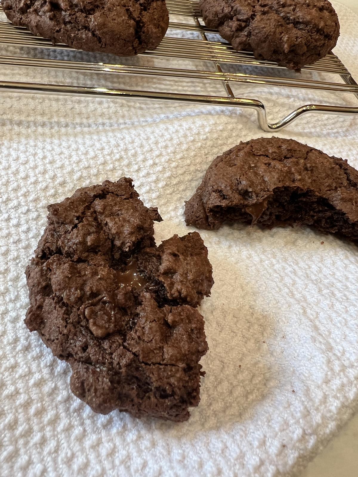 copycat brownie cookie on white napkin with more cookies in background