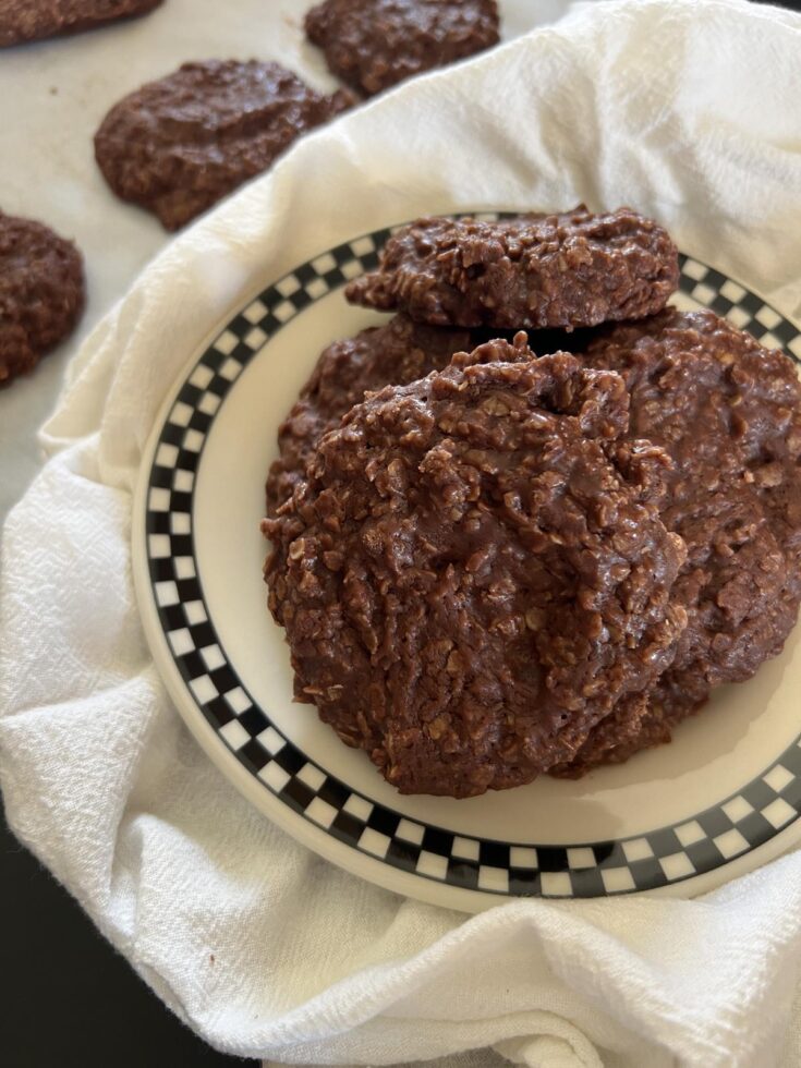 no bake peanut butter free cookies on black and white plate on white napkin