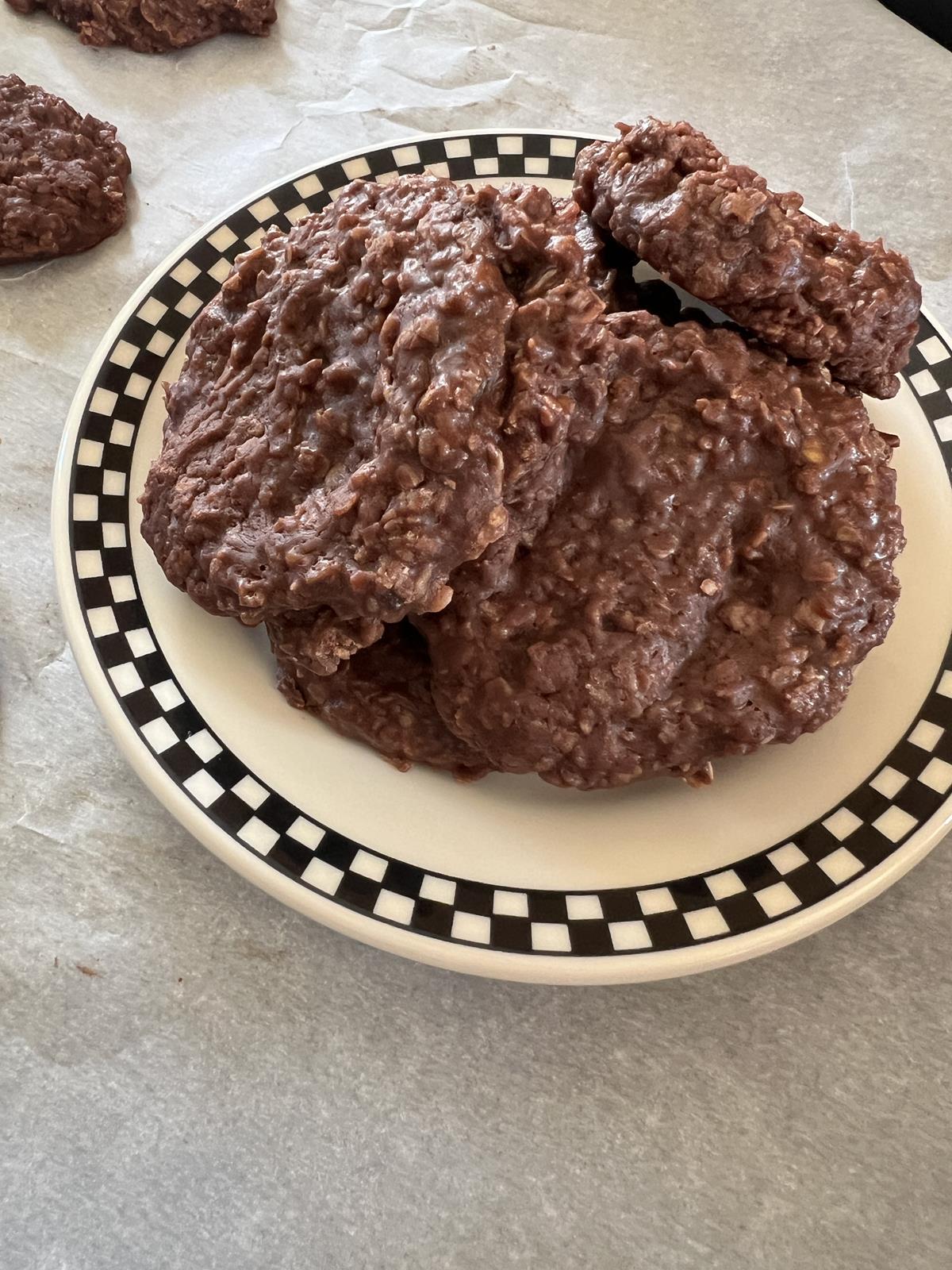 chocolate no bake cookies on black and white plate