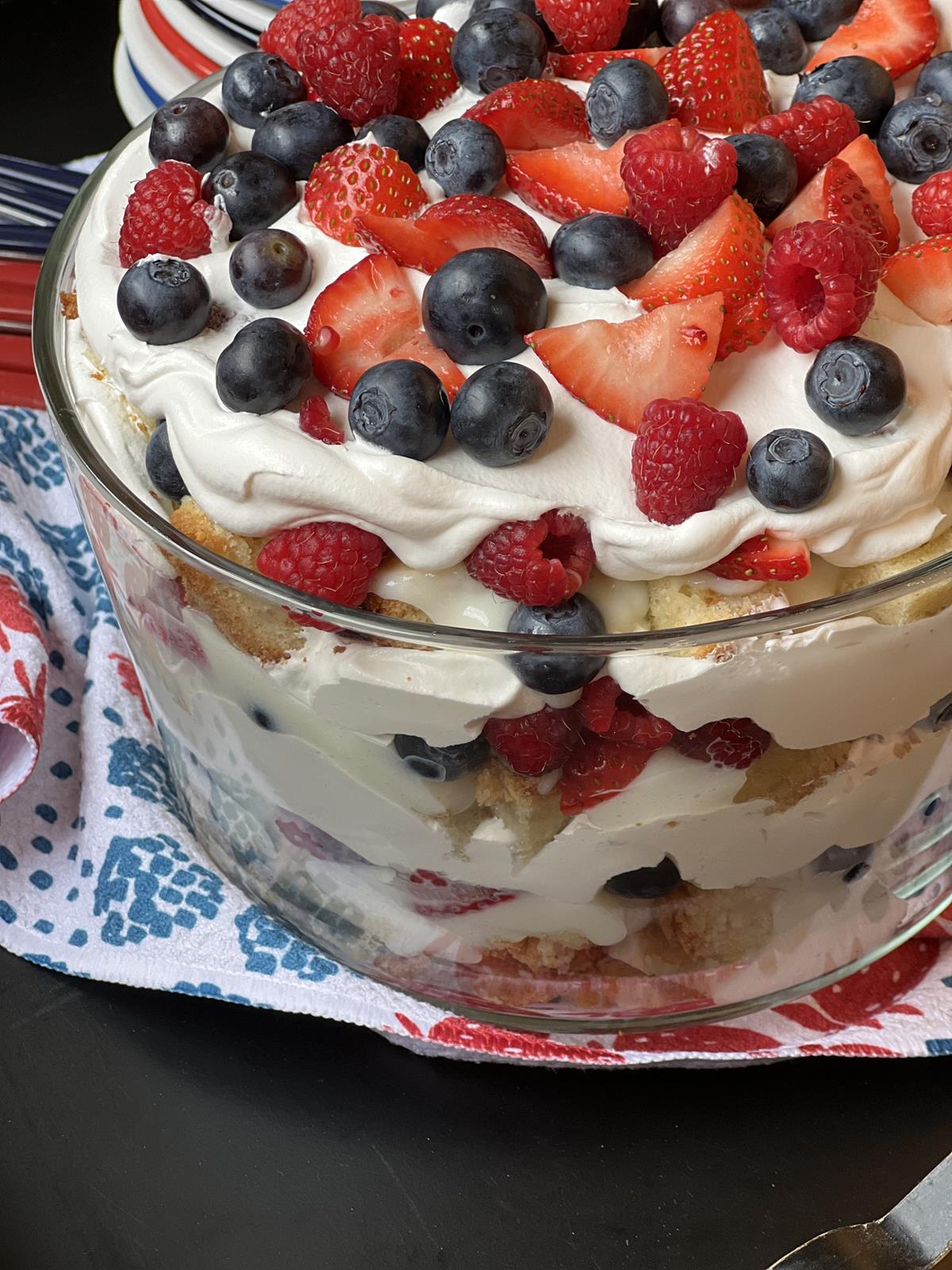 berry pound cake and cool whip in trifle bowl