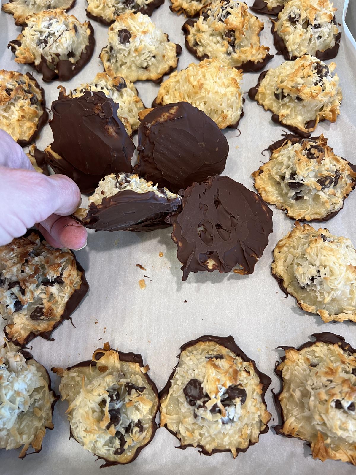 Chocolate Coconut Macaroon with chocolate on parchment paper