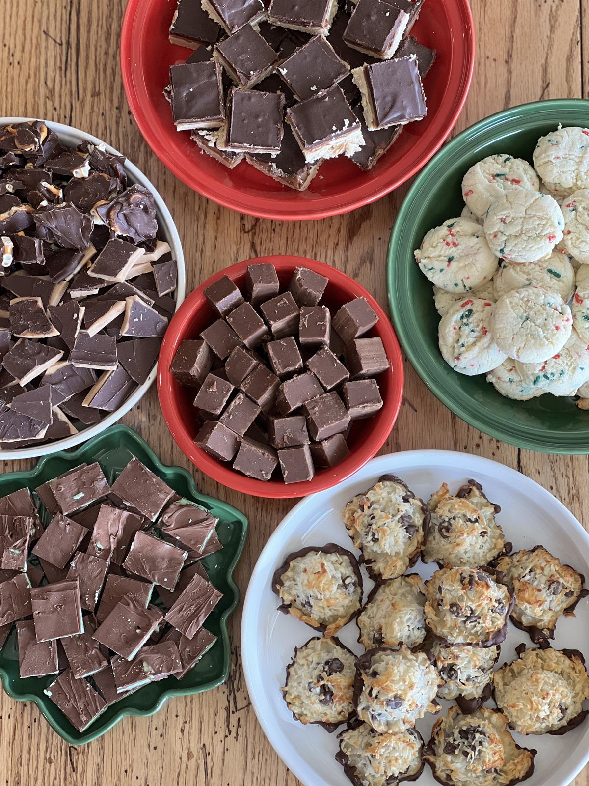 cookies and candies in red, white, and green dishes