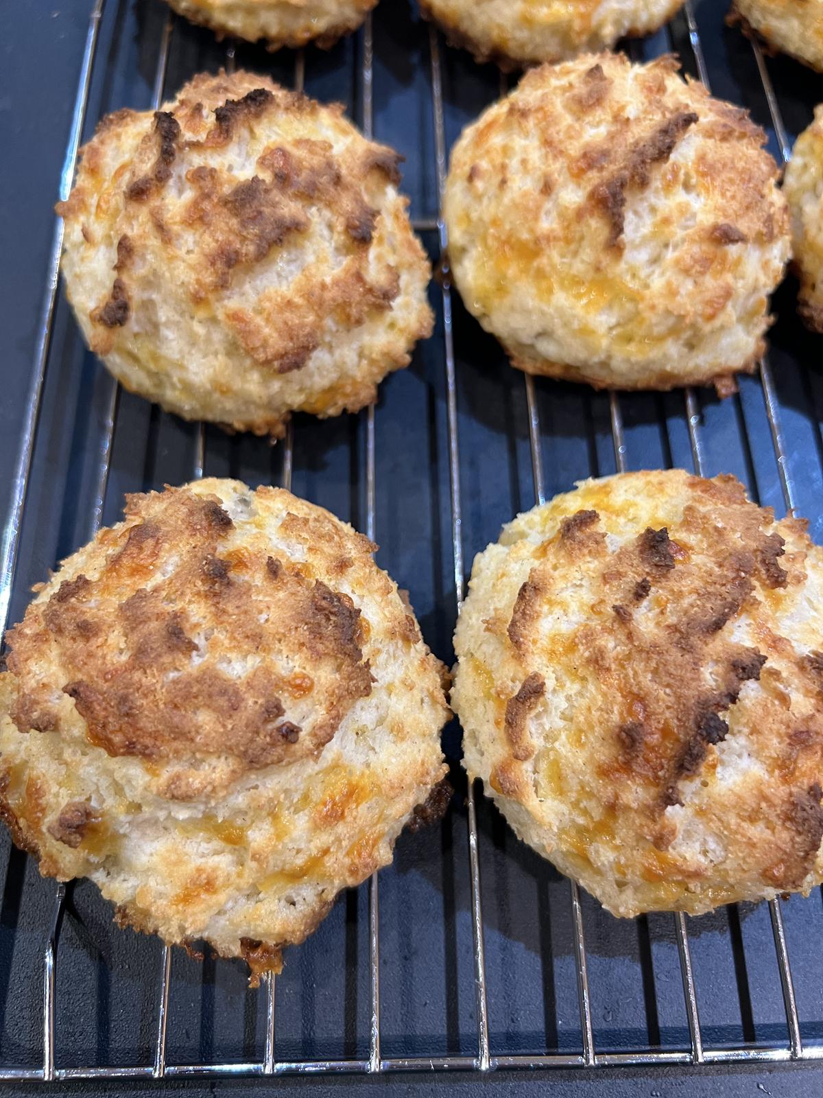 cheddar biscuits on cooking rack